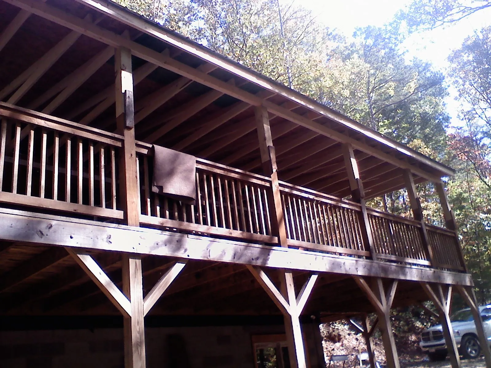 Timber framing under a new elevated porch and deck — Roof Leak Repair in Northridge by Roofing Brothers